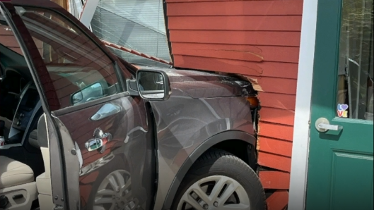 Business damaged after SUV crashes into building on South Shore