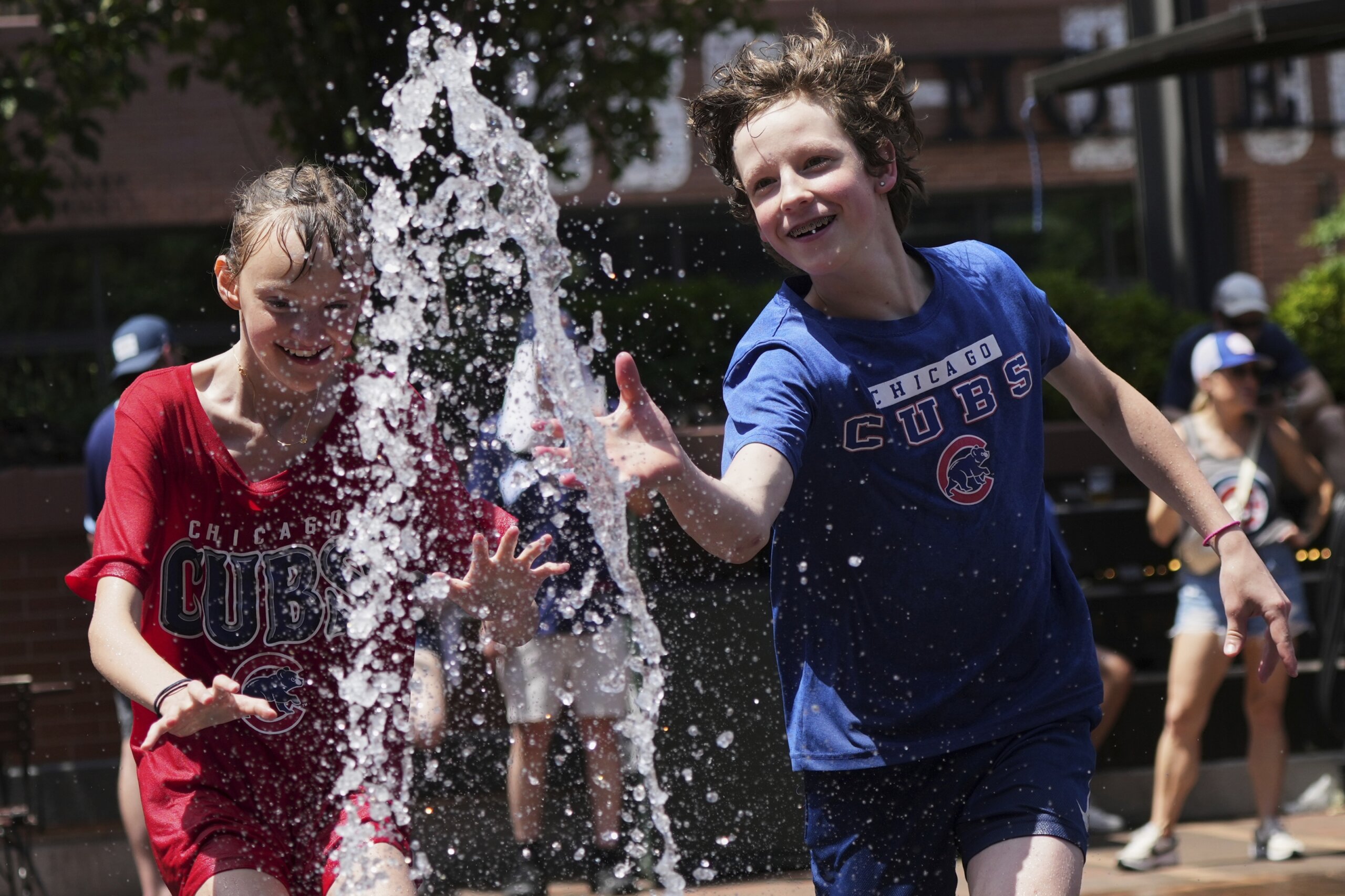 Sports play through another dangerously hot day in parts of the US