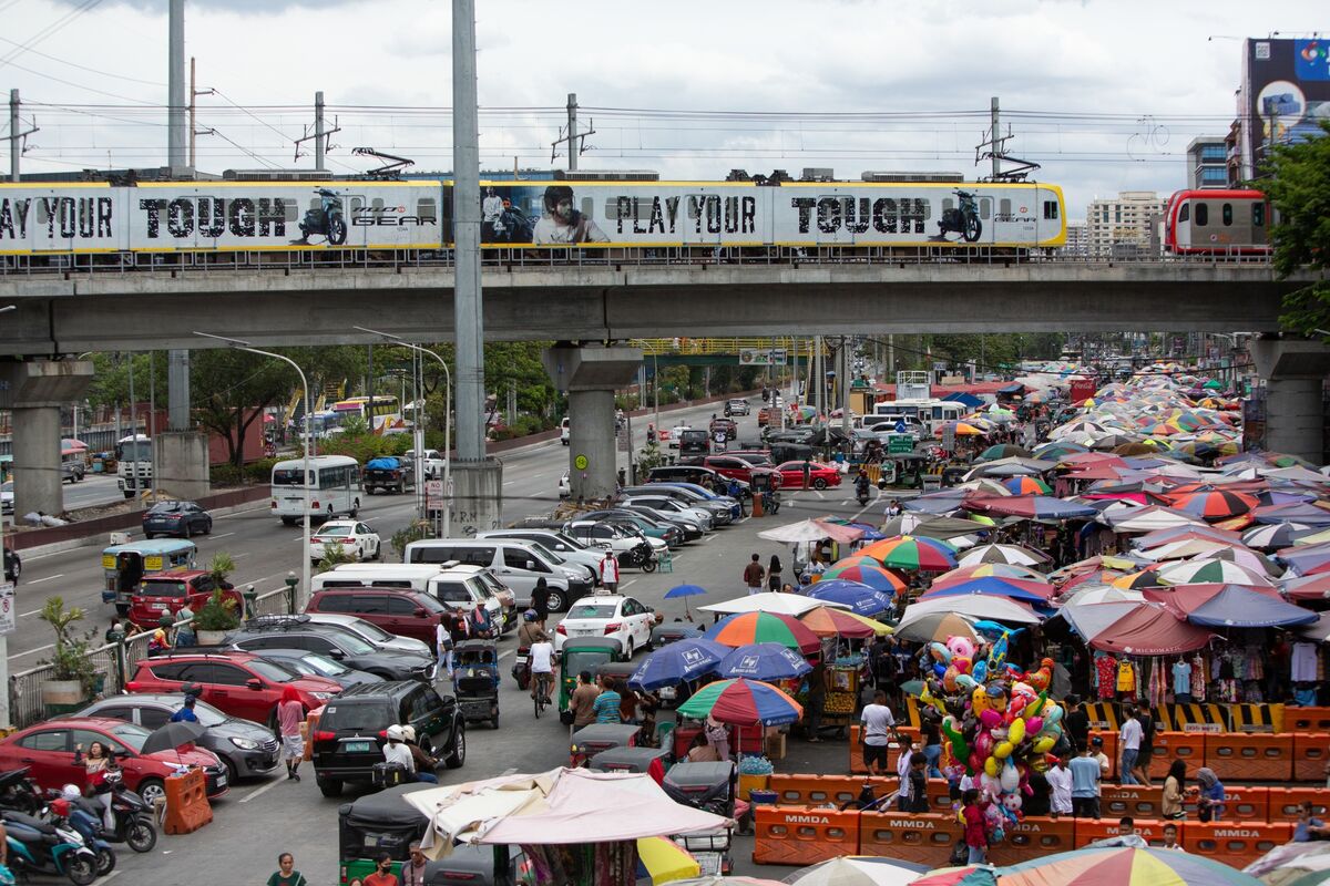 Philippines Cuts 2025 GDP Growth Target, Finance Chief Says