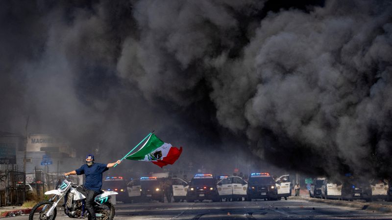 In pictures: Burning cars and tear gas in LA protests