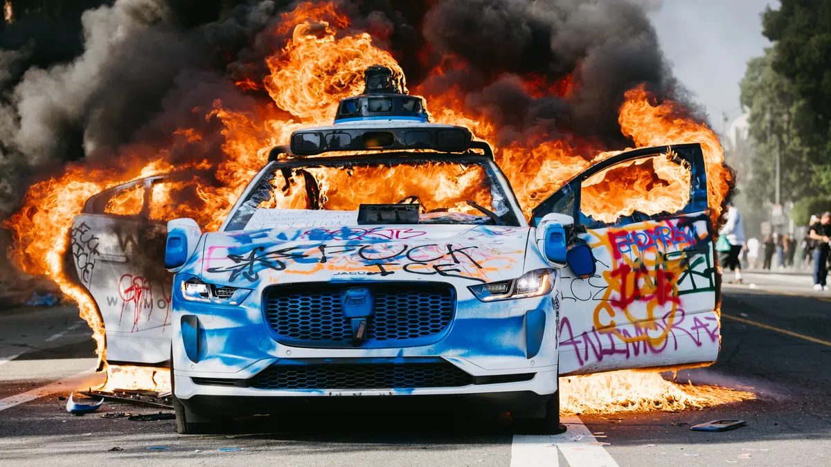 Videos show Waymo cars on fire amid LA protests; service reportedly suspended