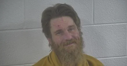 Kentucky man charged with assault after releasing raccoon into open business, causing injury