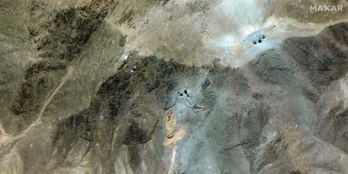 Satellite images appear to show Iranian excavators and bulldozers at work at one of the bombed-out nuclear sites