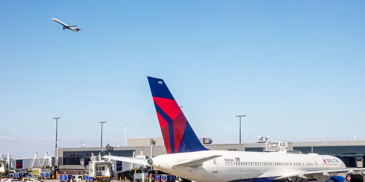 Delta warns of continued disruption at Atlanta airport after severe storms cause canceled flights and the evacuation of an air traffic control tower