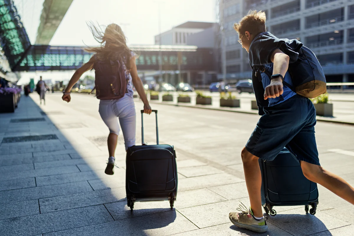 When should you arrive at the airport before a flight?