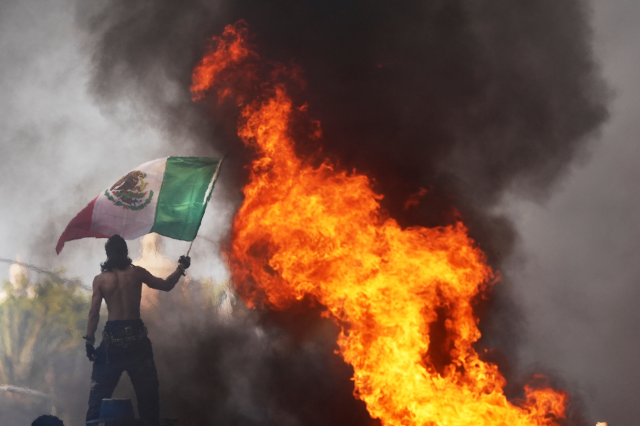 42 arrested, 5 LAPD officers hurt in immigration protest unrest