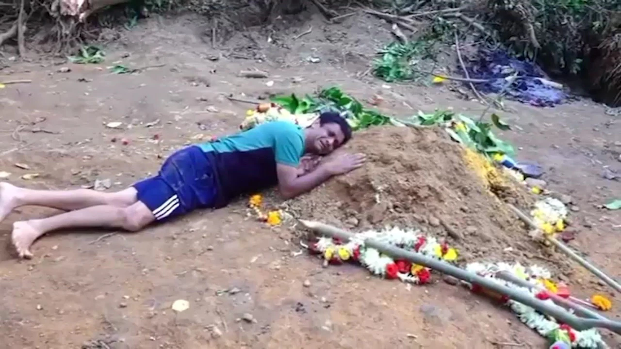 Want to stay here too: Father cries over grave of son killed in Bengaluru stampede