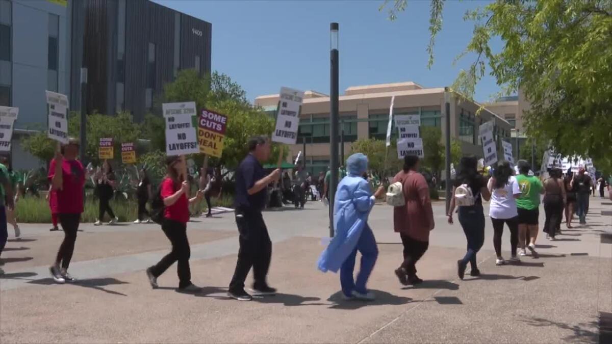Dozens protest after UC San Diego Health lays off more than 200 employees