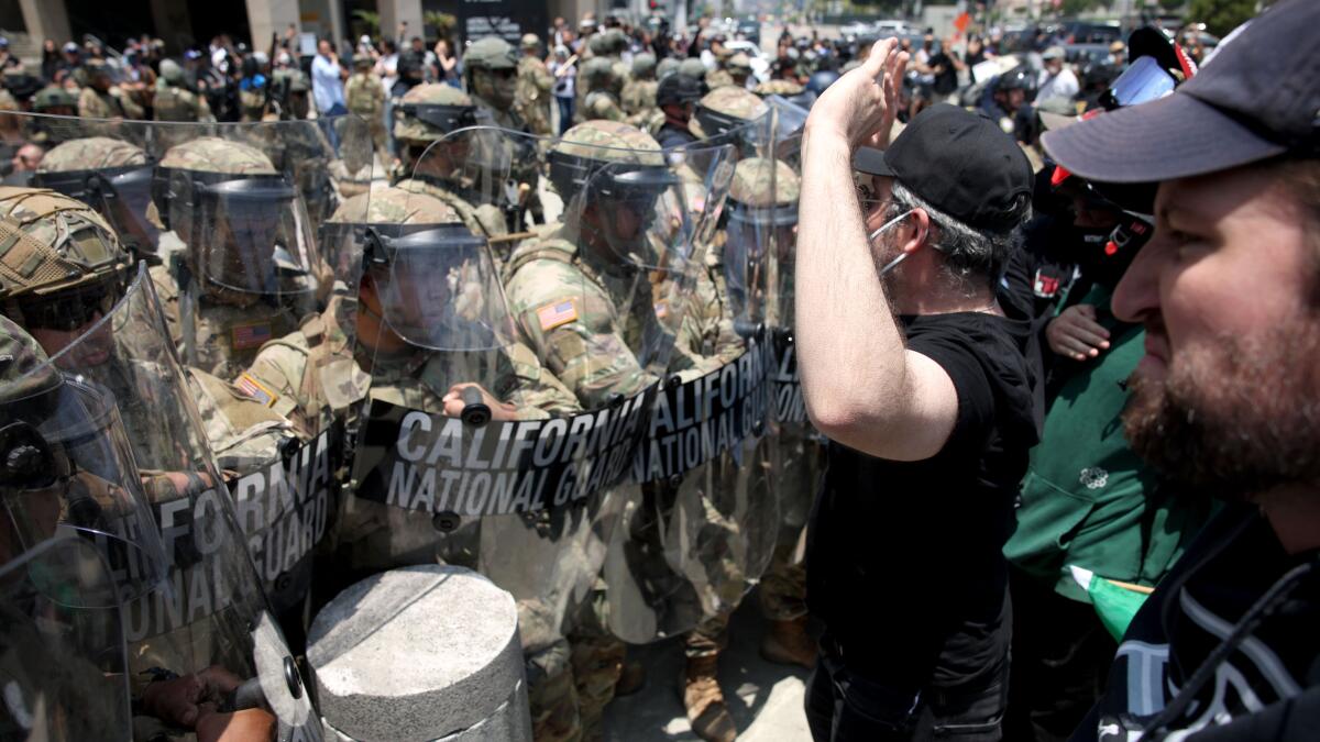 National guard arrives in Los Angeles as fallout from immigration raids continues
