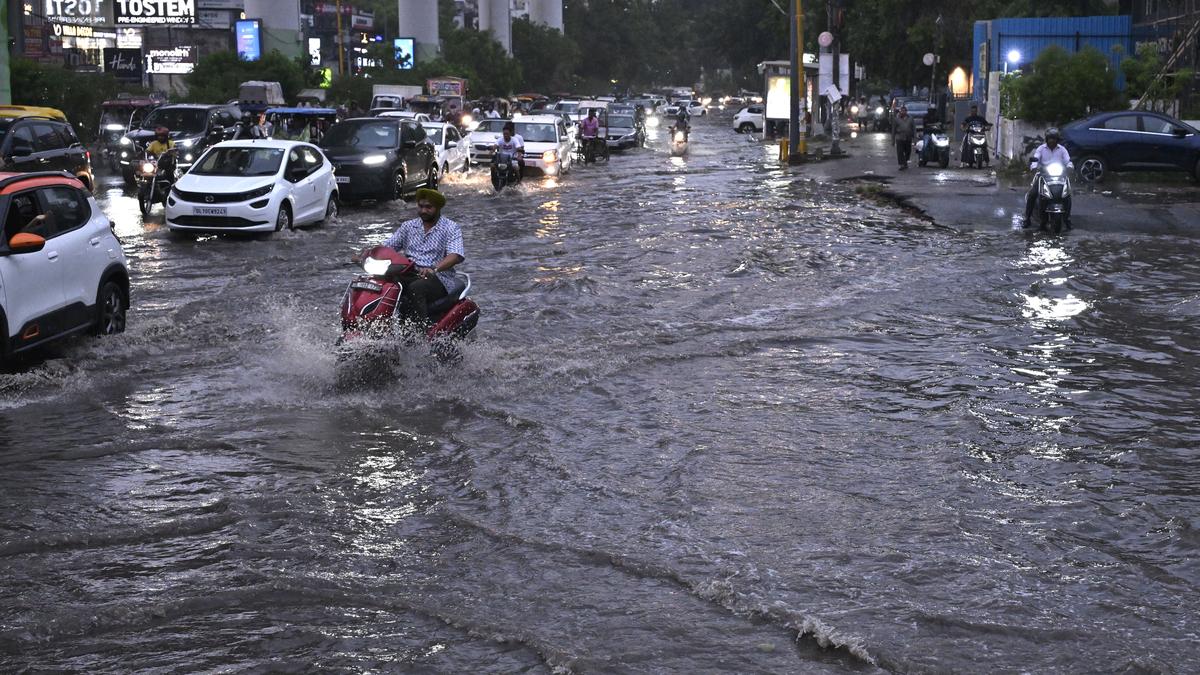 Rain floods roads, disrupts flights; brings heat relief
