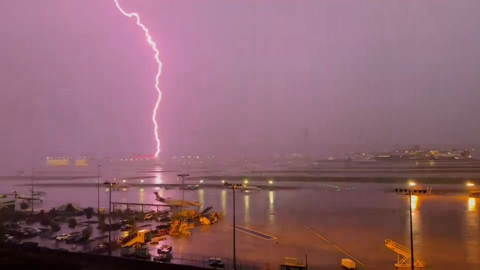 Severe storm triggers hundreds of flight cancellations at busy Atlanta airport just as holiday travel cranks up