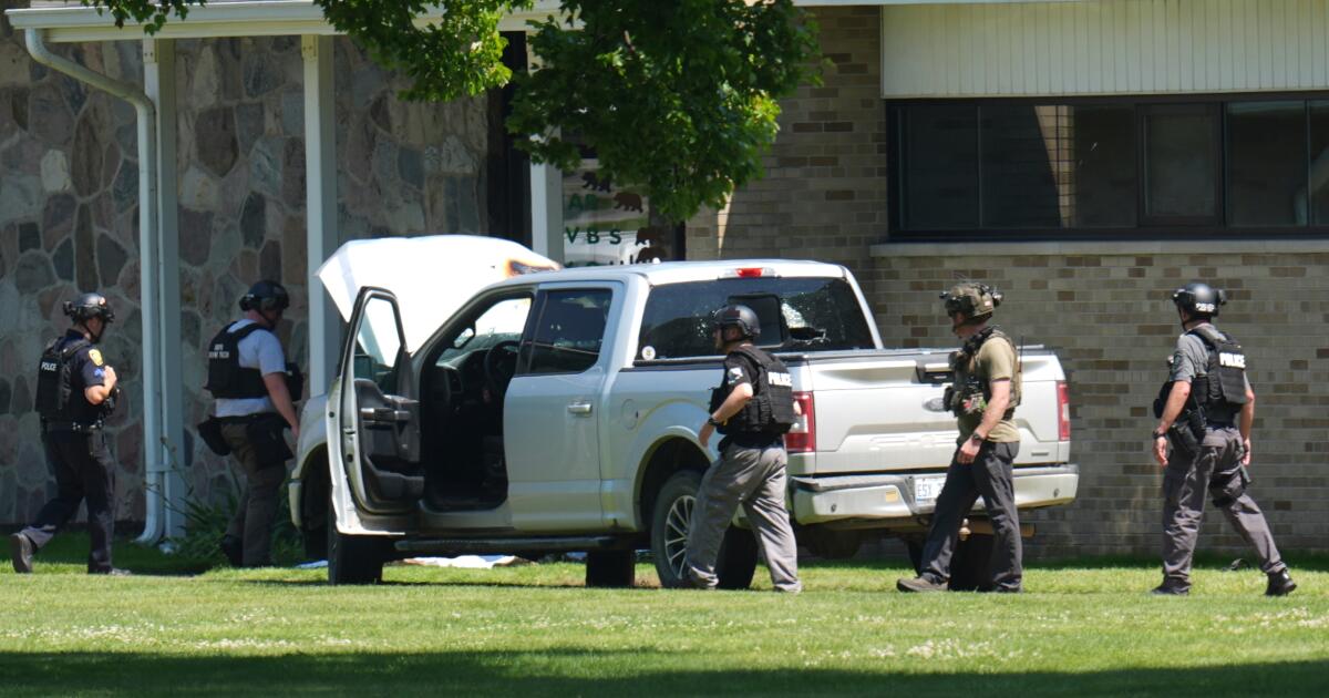 Man opened fire outside Michigan church before staff fatally shot him, averting mass shooting, police say