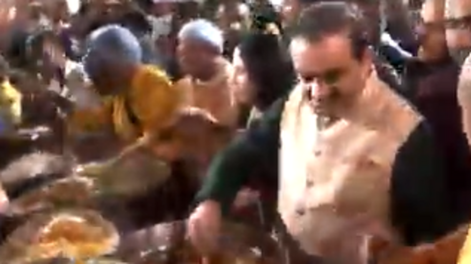 Watch: Gautam Adani and wife Priti Adani cook, serve prasad at Rath Yatra in Puri