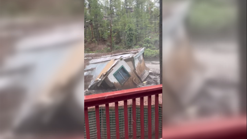 Trailer Swept Away By Raging Floodwaters