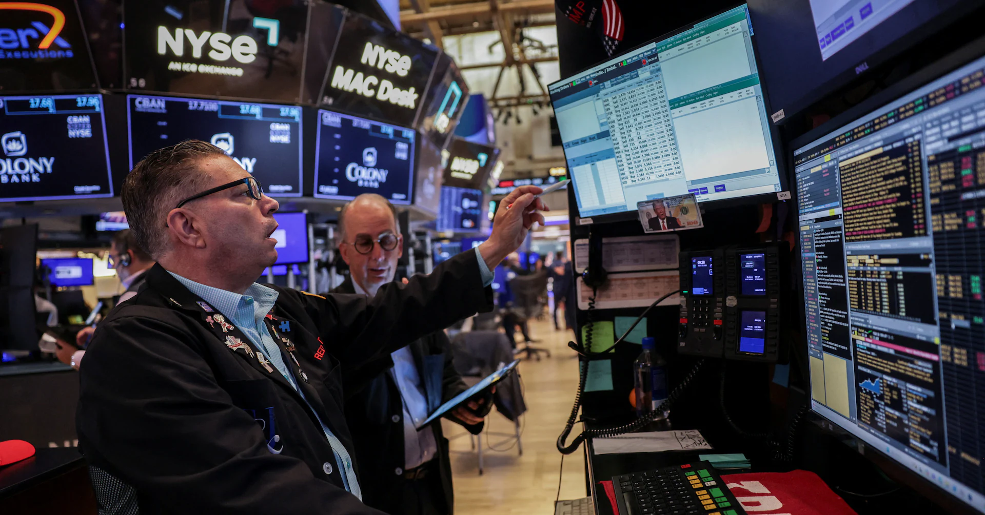 Morning Bid: Trade relief, business lift and market high