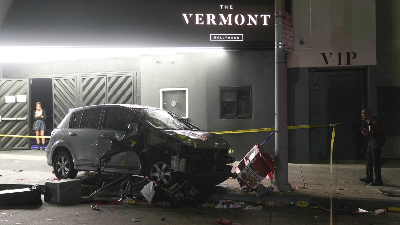Man whose car struck crowd outside Los Angeles club, injuring 30, was shot, attacked by crowd