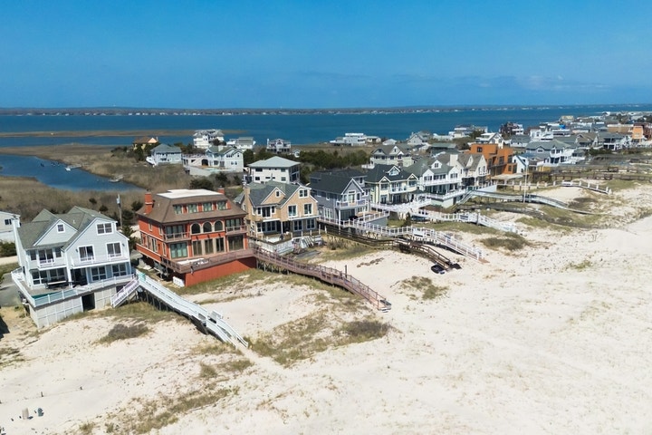 He's 66, Retired, And Has $1.9M In An IRA — Should He Pay Cash or Finance a Vacation Home?