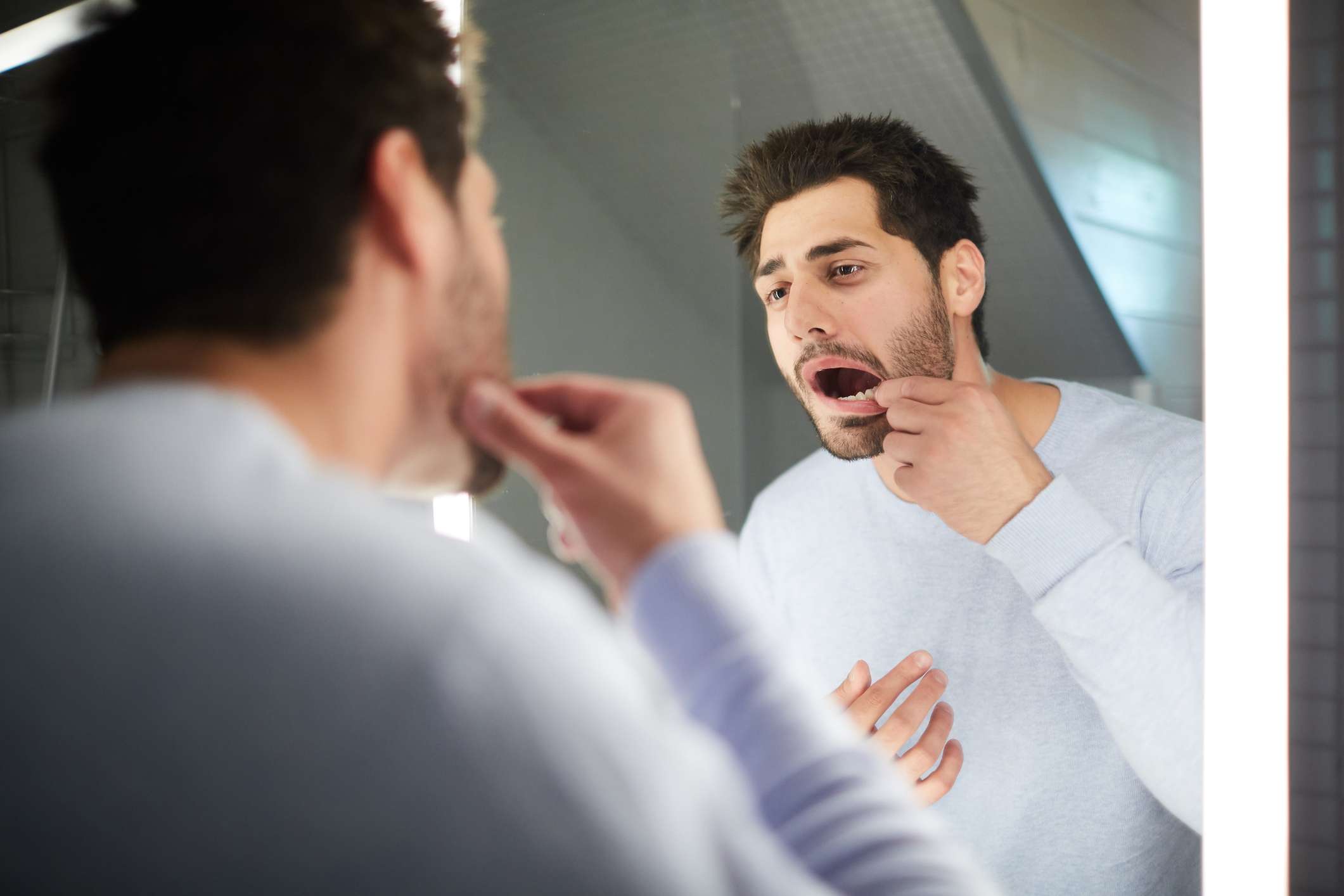 These tongue and mouth changes could be a sign of HIV
