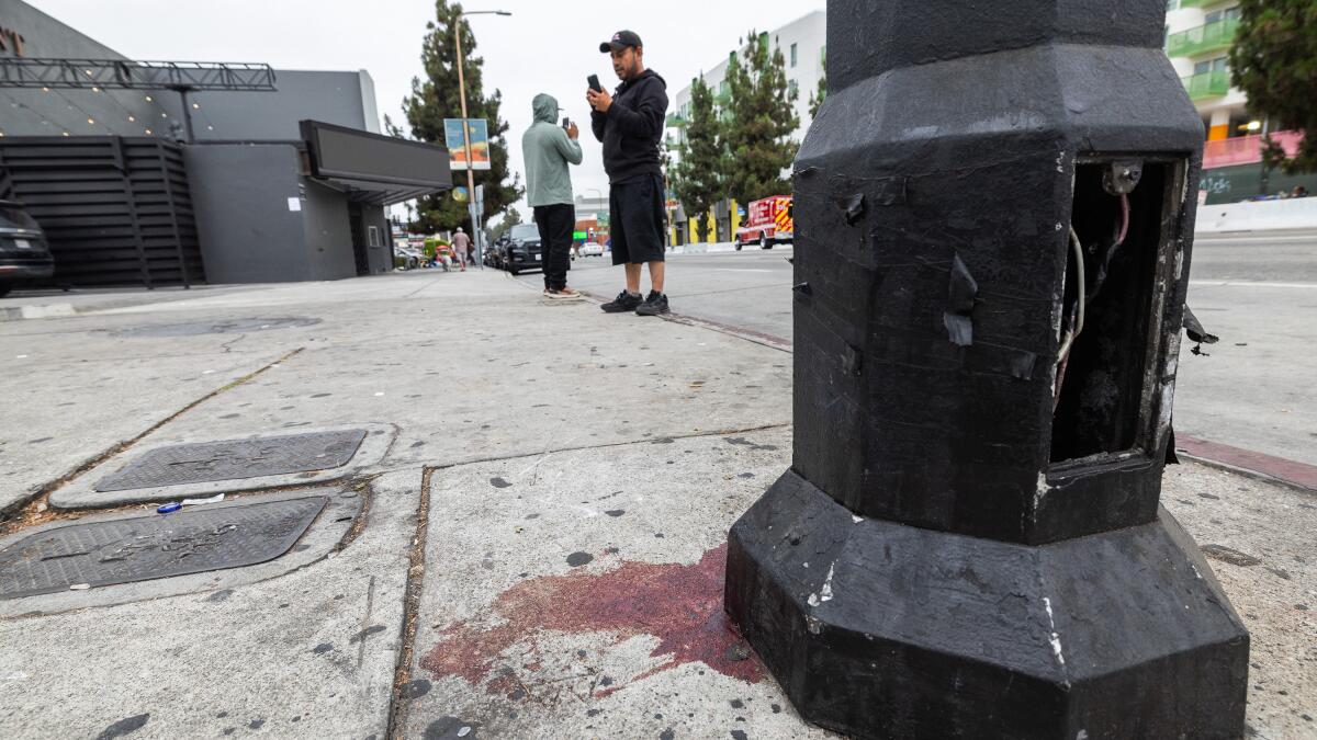 Police still searching for shooter of the driver who plowed into crowd outside Hollywood club