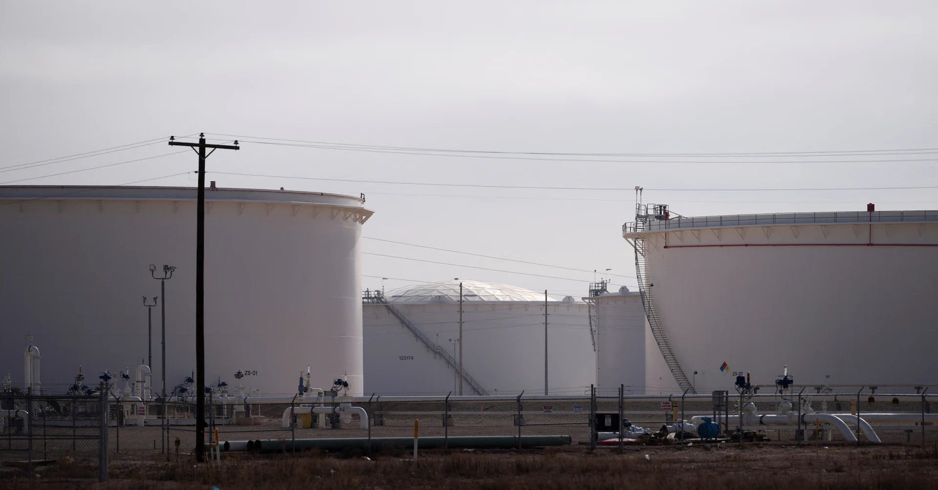 Oil prices little changed as investors eye impact of new sanctions on Russia