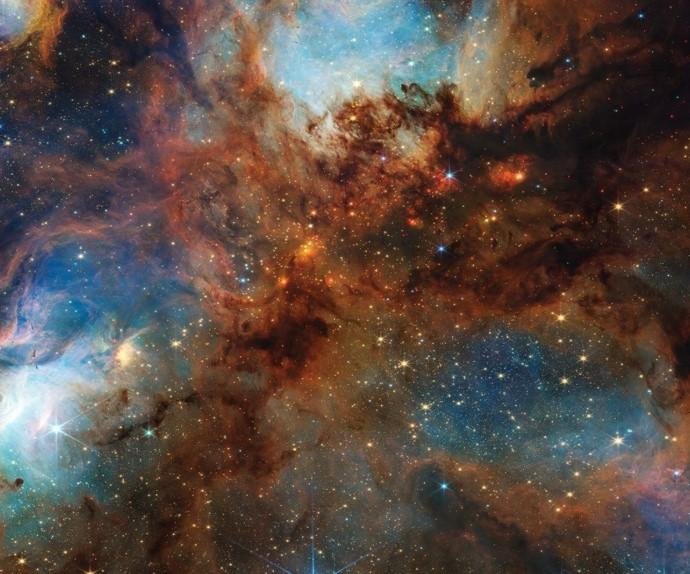 NASA 'claws back' thick dust layer in Cat's Claw Nebula