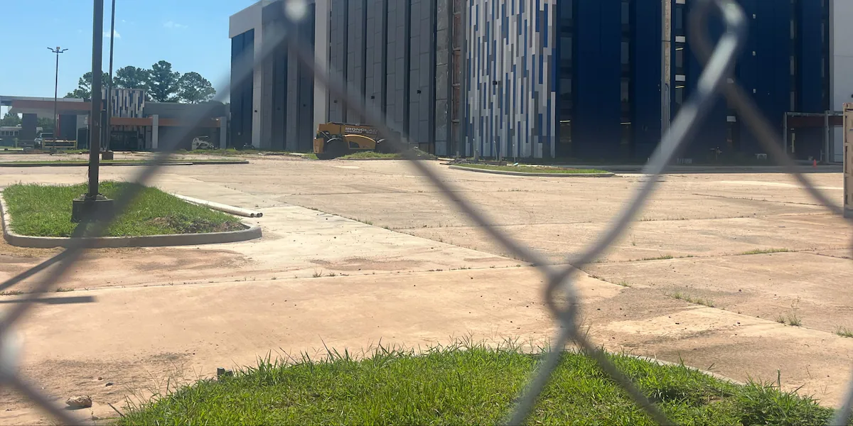 ‘It’s a huge eyesore’: Nearby business owners tired of hotel that’s been under construction since 20