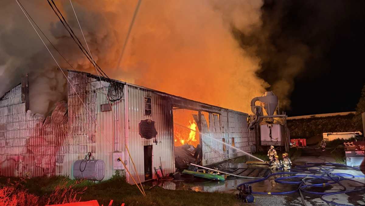Crews tear down wreckage, investigate business fire in Lancaster County