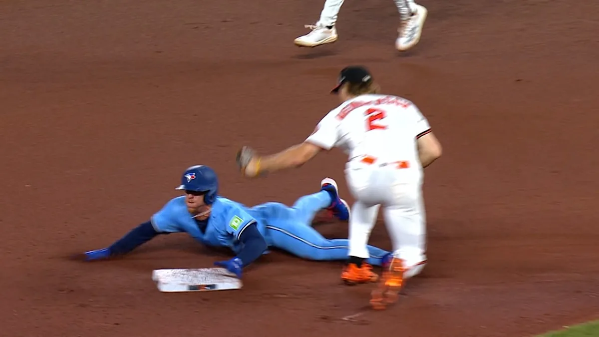 Miles Straw steals second base