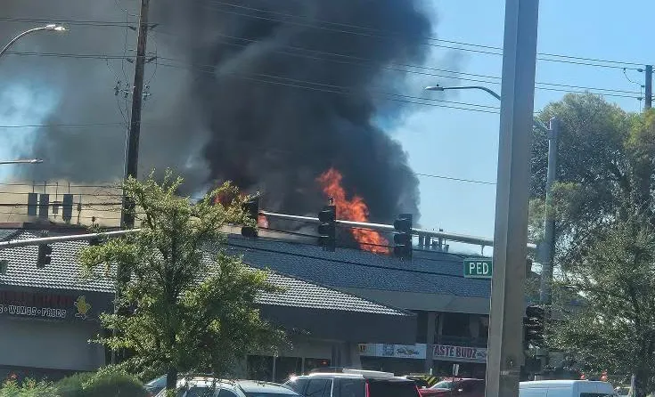 Fire crews battle large fire near UNLV