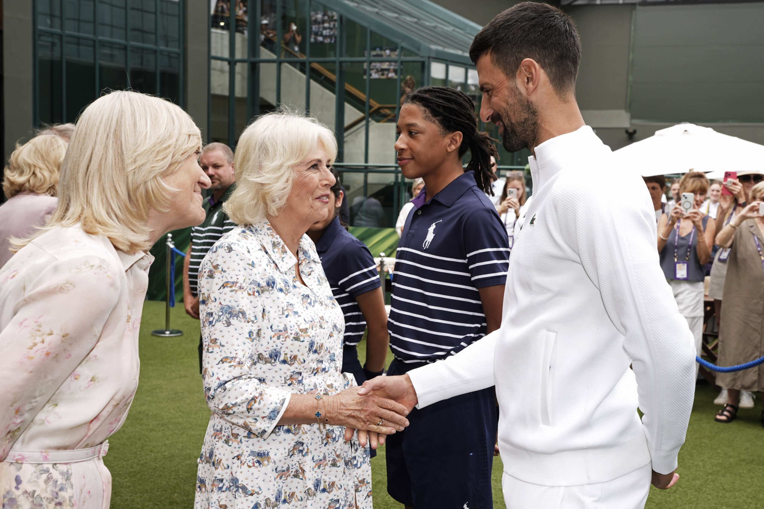 Queen Camilla visits Wimbledon and watches quarterfinal match at Centre Court