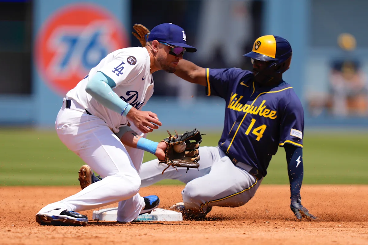 Brewers tie Cubs for first place with 10th straight win, while slumping Dodgers lose Freddie Freeman to wrist contusion