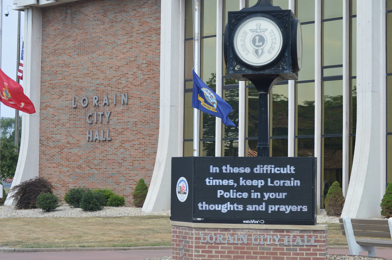 Police continue search for motive in Lorain ambush that killed one officer, wounded two others officers
