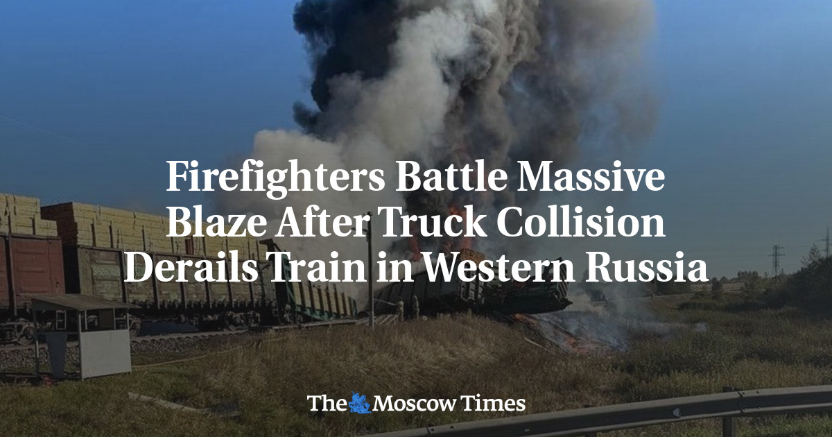 Firefighters Battle Massive Blaze After Truck Collision Derails Train in Western Russia